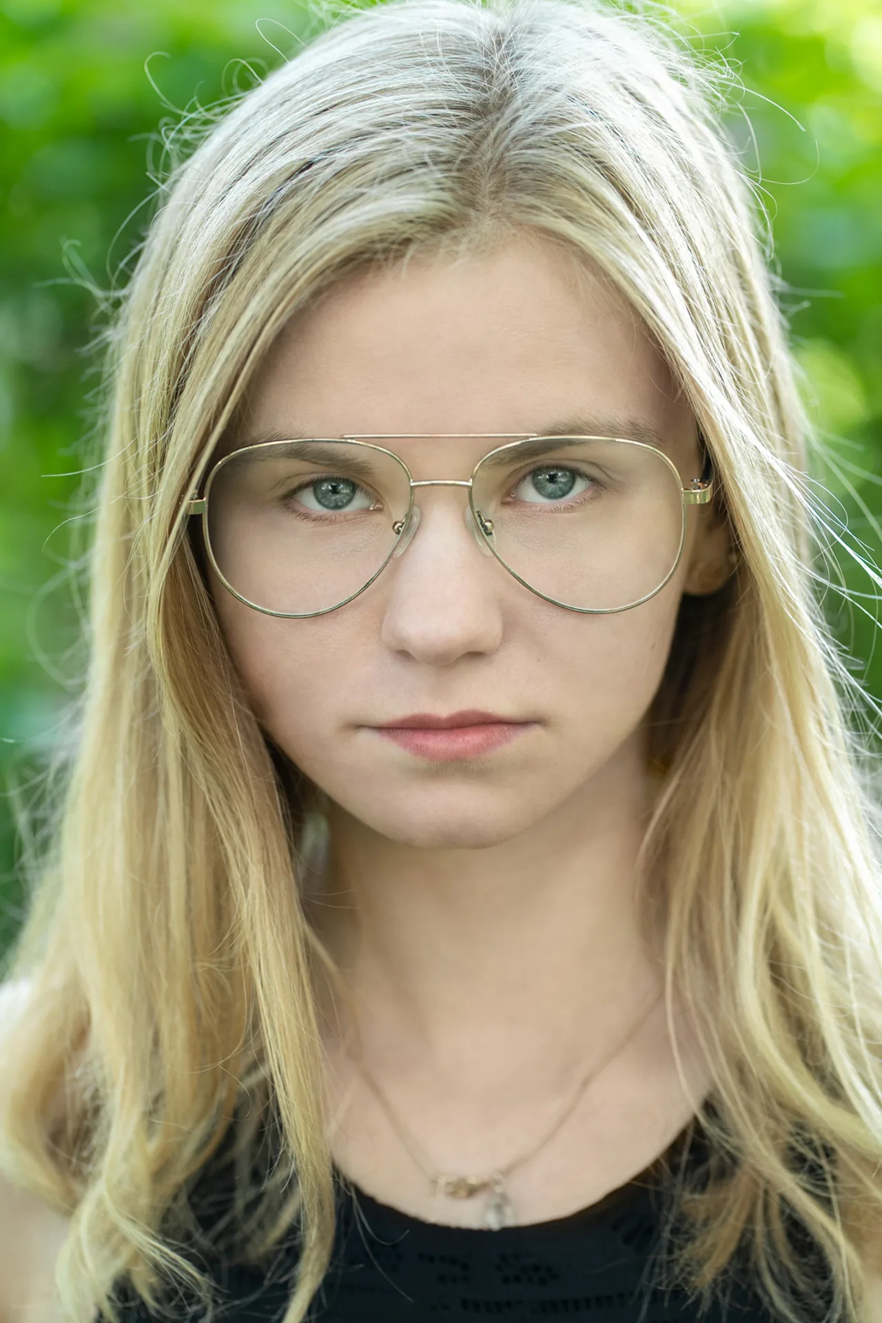 Portree naisest, pildistas fotograaf Mailis Vahenurm.